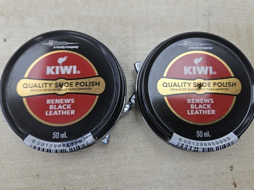Two tins kiwi - two, shoe